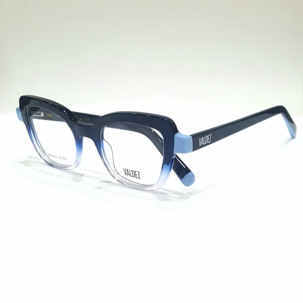 Armazón de acetato azul oscuro, disponible en el local