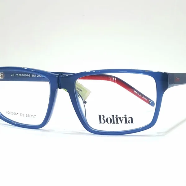 Armazón rectangular azul con interior bordó, disponible en el local