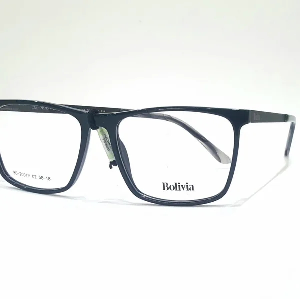 Armazón rectangular negro de acetato, disponible en el local